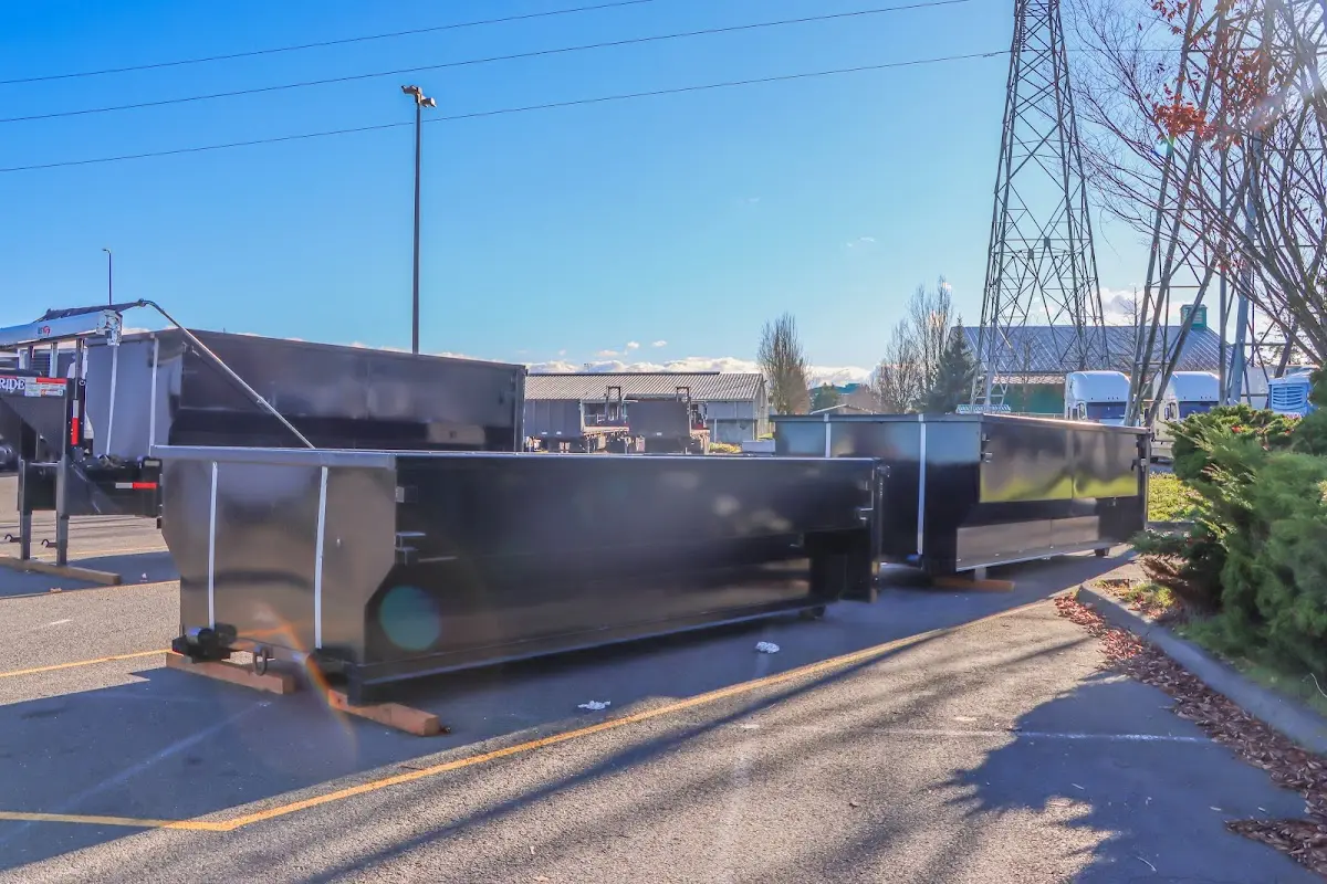 Roll-off dumpster ready for waste disposal at job site for 4 Yard Dumpster Rental in Ware